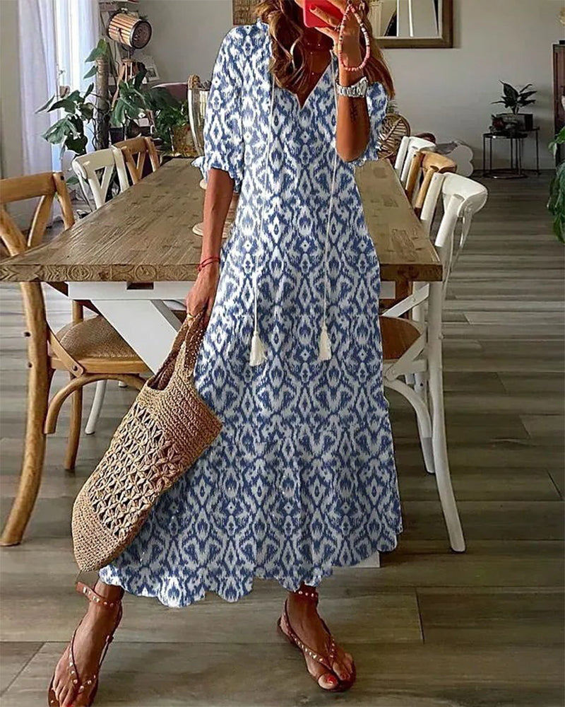 Robe midi fluide à encolure en V avec liens – Légère, féminine & polyvalente