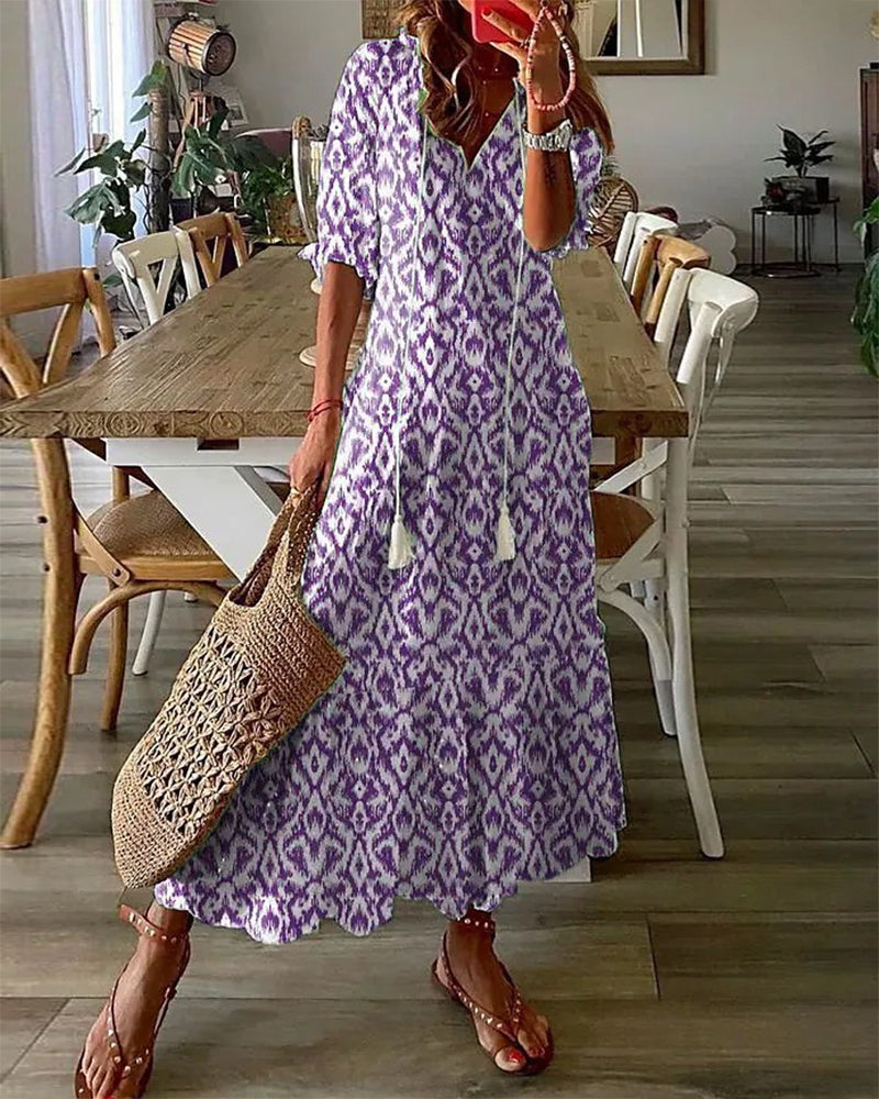 Robe midi fluide à encolure en V avec liens – Légère, féminine & polyvalente
