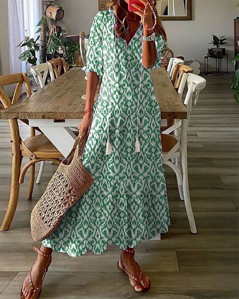 Robe midi fluide à encolure en V avec liens – Légère, féminine & polyvalente