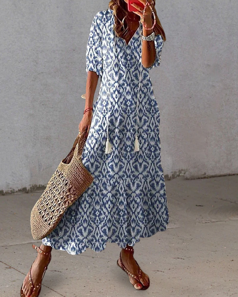 Robe midi fluide à encolure en V avec liens – Légère, féminine & polyvalente