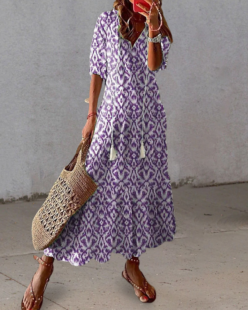 Robe midi fluide à encolure en V avec liens – Légère, féminine & polyvalente