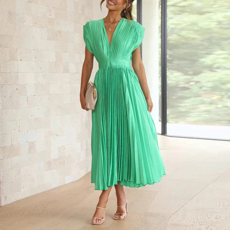 Robe plissée élégante à col V – Féminité, légèreté & élégance intemporelle