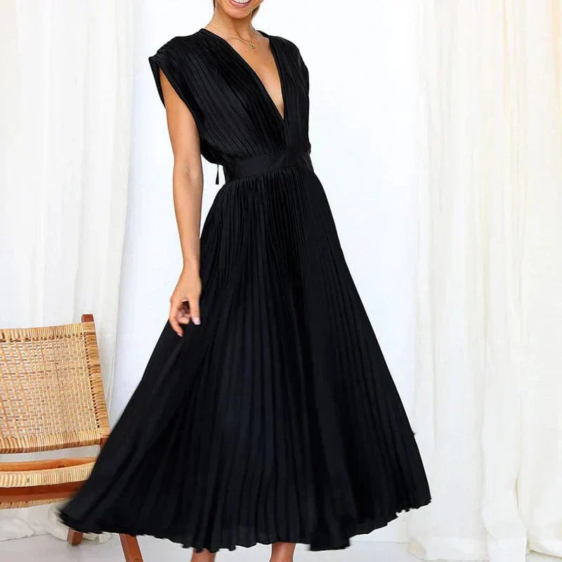 Robe plissée élégante à col V – Féminité, légèreté & élégance intemporelle