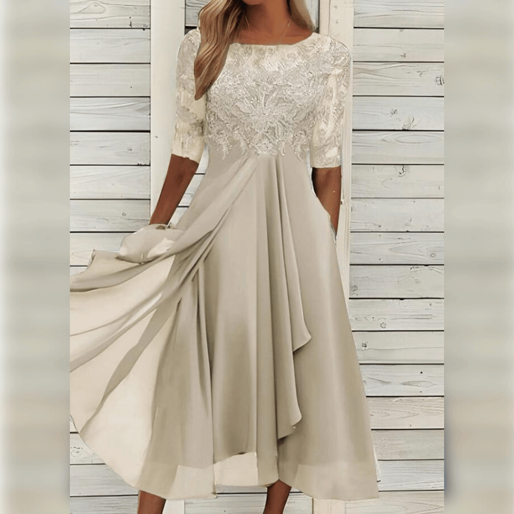 Robe élégante en dentelle avec jupe fluide – Raffinement, légèreté & style intemporel